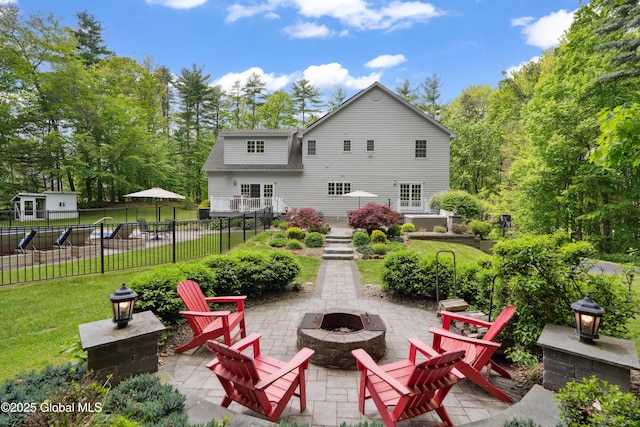 151 Edie Rd, Wilton, NY 12866 - rear view of property featuring an outdoor fire pit and a patio area
