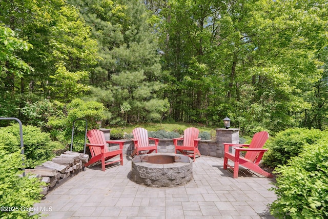 151 Edie Rd, Wilton, NY 12866 - view of patio / terrace with a fire pit
