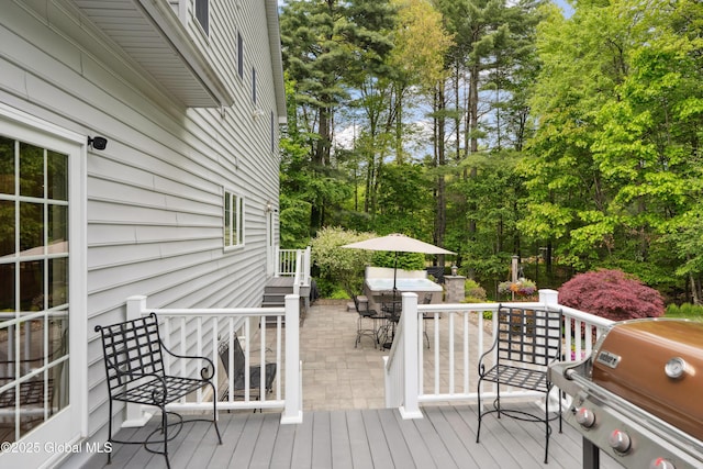 151 Edie Rd, Wilton, NY 12866 - deck with area for grilling, view of scattered trees, and outdoor dining space