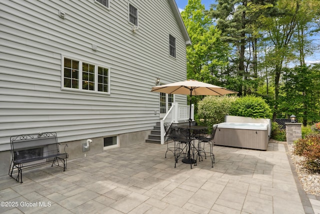 151 Edie Rd, Wilton, NY 12866 - view of patio / terrace featuring a hot tub and outdoor dining area