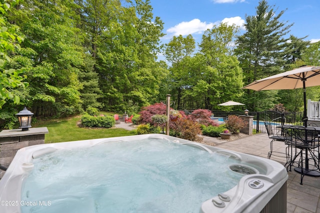 151 Edie Rd, Wilton, NY 12866 - view of patio / terrace featuring a hot tub and a pool