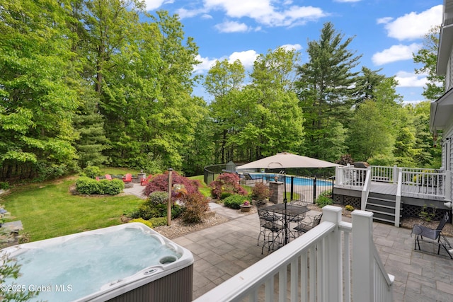 151 Edie Rd, Wilton, NY 12866 - view of patio / terrace featuring a deck, a hot tub, and outdoor dining area