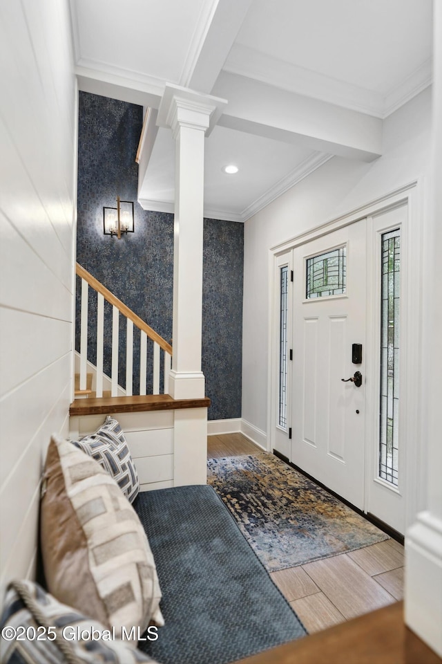 151 Edie Rd, Wilton, NY 12866 - entryway with wood finished floors, crown molding, recessed lighting, ornate columns, and stairway