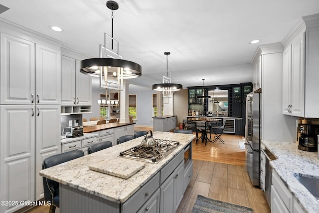 151 Edie Rd, Wilton, NY 12866 - kitchen with appliances with stainless steel finishes, gray cabinets, white cabinetry, recessed lighting, and a center island