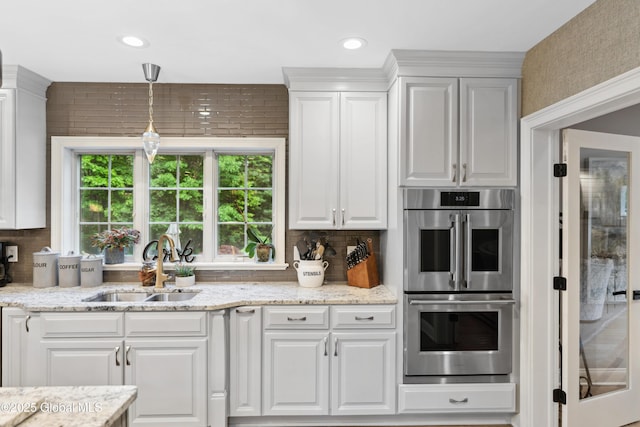 151 Edie Rd, Wilton, NY 12866 - kitchen featuring double oven, a sink, white cabinets, tasteful backsplash, and recessed lighting