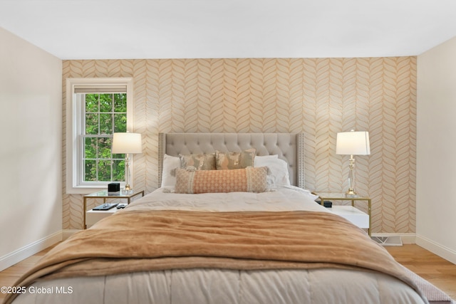 151 Edie Rd, Wilton, NY 12866 - bedroom with baseboards and light wood-style floors