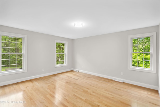 151 Edie Rd, Wilton, NY 12866 - empty room with baseboards and light wood-style flooring