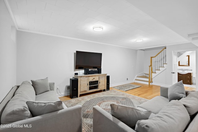 151 Edie Rd, Wilton, NY 12866 - living room with ornamental molding, stairs, light wood-style flooring, and baseboards