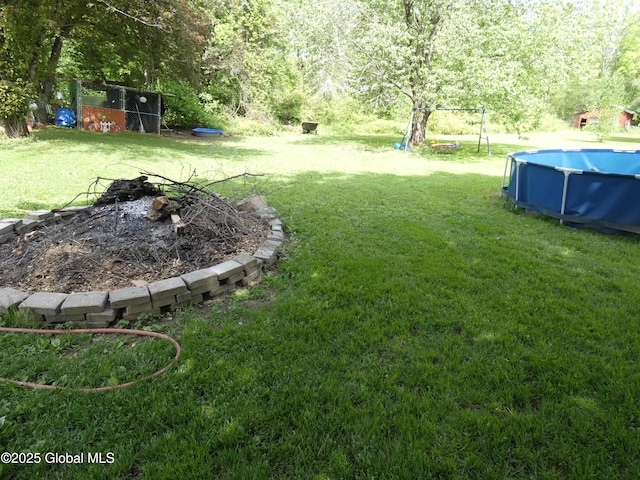 2541 N Line Rd, Galway, NY 12074 - view of grassy yard with an outdoor pool