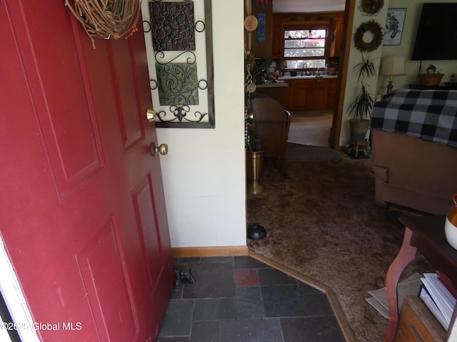2541 N Line Rd, Galway, NY 12074 - foyer with dark stone finish floors and baseboards