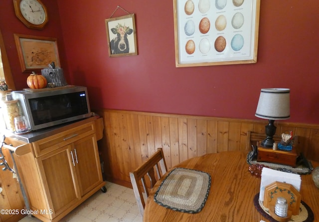 2541 N Line Rd, Galway, NY 12074 - dining space featuring a wainscoted wall and wood walls