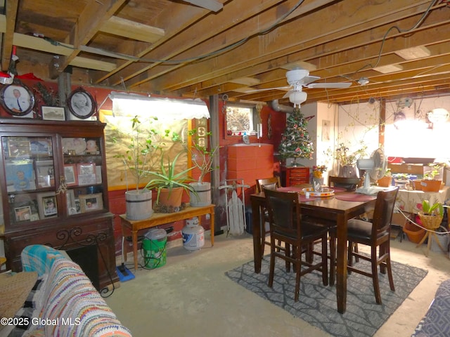2541 N Line Rd, Galway, NY 12074 - dining area with unfinished concrete floors and a ceiling fan