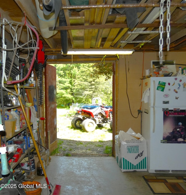 2541 N Line Rd, Galway, NY 12074 - garage featuring freestanding refrigerator