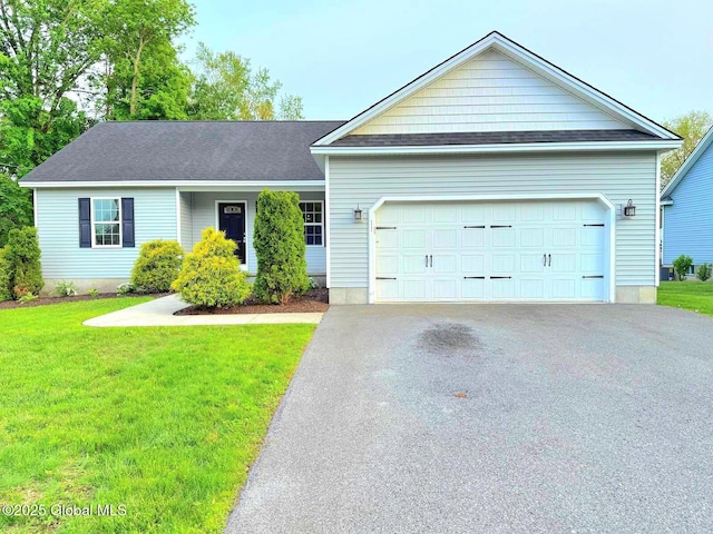 11 E Boylston St, Glens Falls, NY 12801 - ranch-style home featuring asphalt driveway, a front yard, an attached garage, and a shingled roof