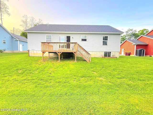 11 E Boylston St, Glens Falls, NY 12801 - rear view of property featuring a deck and a lawn