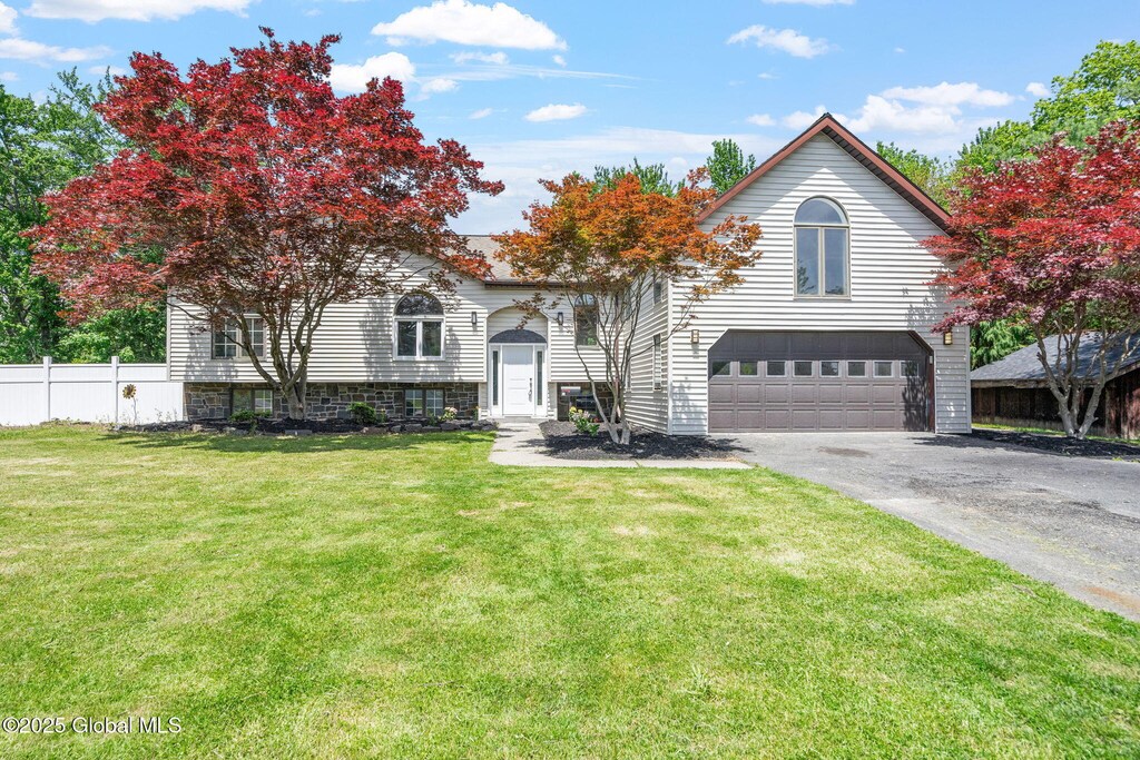 30 Point View Dr, East Greenbush, NY 12061 - view of front of home featuring a garage and asphalt driveway