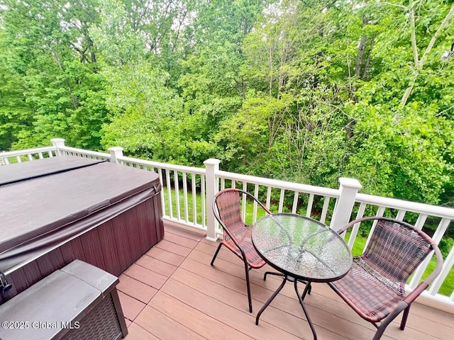 181 Fieldstone Dr, Niskayuna, NY 12304 - deck with a hot tub and a view of trees