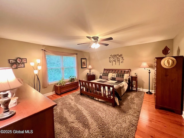 181 Fieldstone Dr, Niskayuna, NY 12304 - bedroom with wood finished floors, a ceiling fan, and baseboards