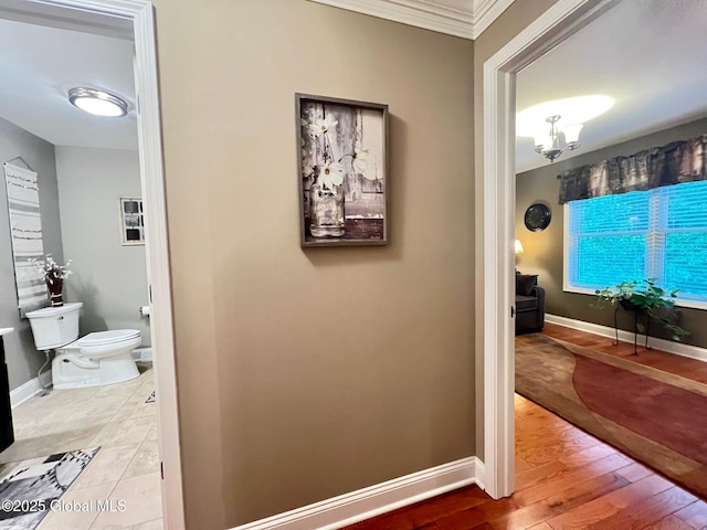 181 Fieldstone Dr, Niskayuna, NY 12304 - corridor featuring ornamental molding, baseboards, and wood finished floors