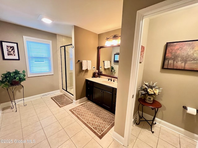 181 Fieldstone Dr, Niskayuna, NY 12304 - bathroom with tile patterned floors, a stall shower, vanity, and baseboards
