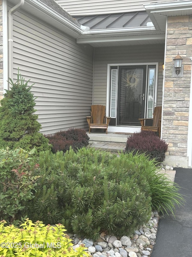 181 Fieldstone Dr, Niskayuna, NY 12304 - entrance to property with stone siding and a porch