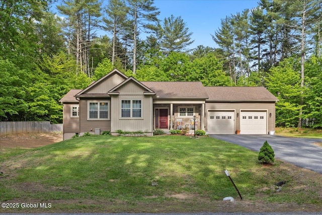 33 White Birch Dr, Lake Luzerne, NY 12846 - view of front of home featuring an attached garage and driveway