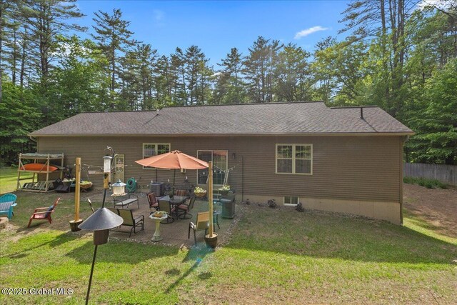 33 White Birch Dr, Lake Luzerne, NY 12846 - back of house with a lawn, a patio area, and roof with shingles