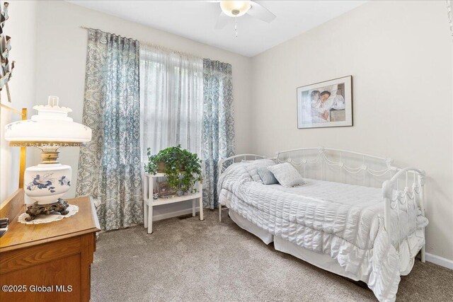 33 White Birch Dr, Lake Luzerne, NY 12846 - bedroom featuring carpet floors, ceiling fan, and baseboards