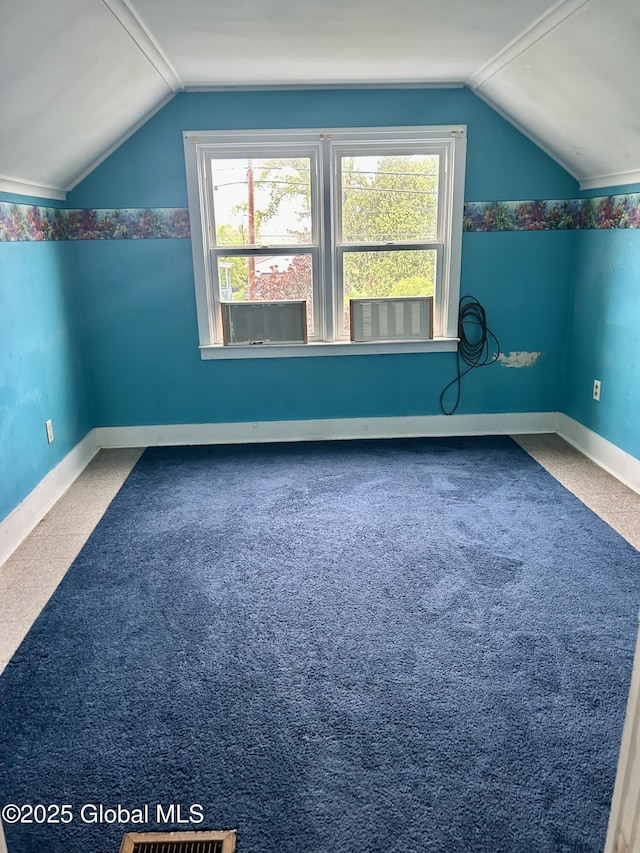 545 Gansevoort Rd, South Glens Falls, NY 12803 - bonus room with vaulted ceiling, plenty of natural light, baseboards, and carpet