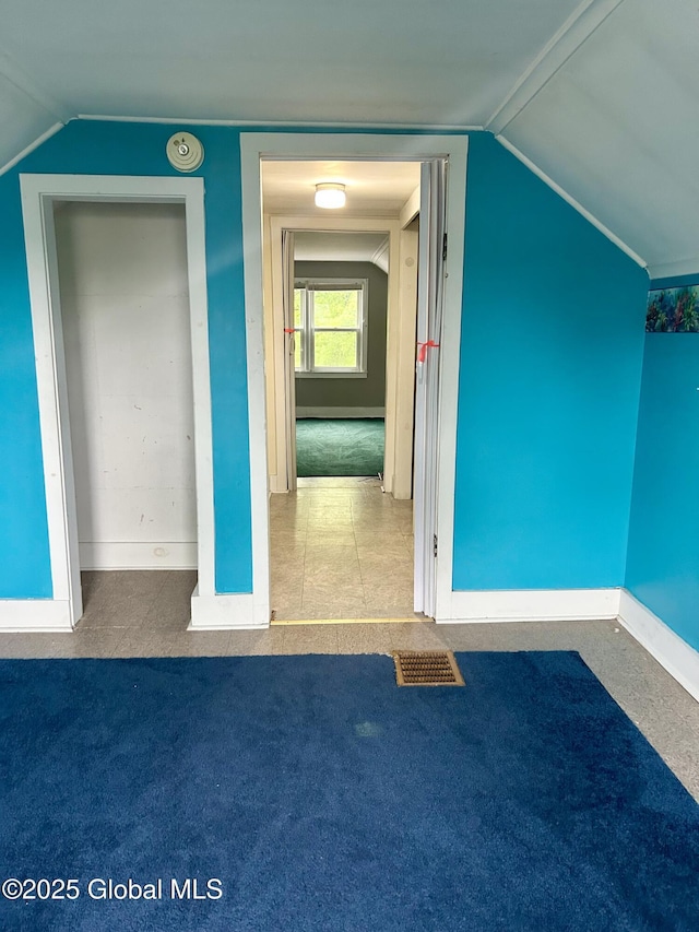 545 Gansevoort Rd, South Glens Falls, NY 12803 - additional living space featuring vaulted ceiling, baseboards, and carpet floors