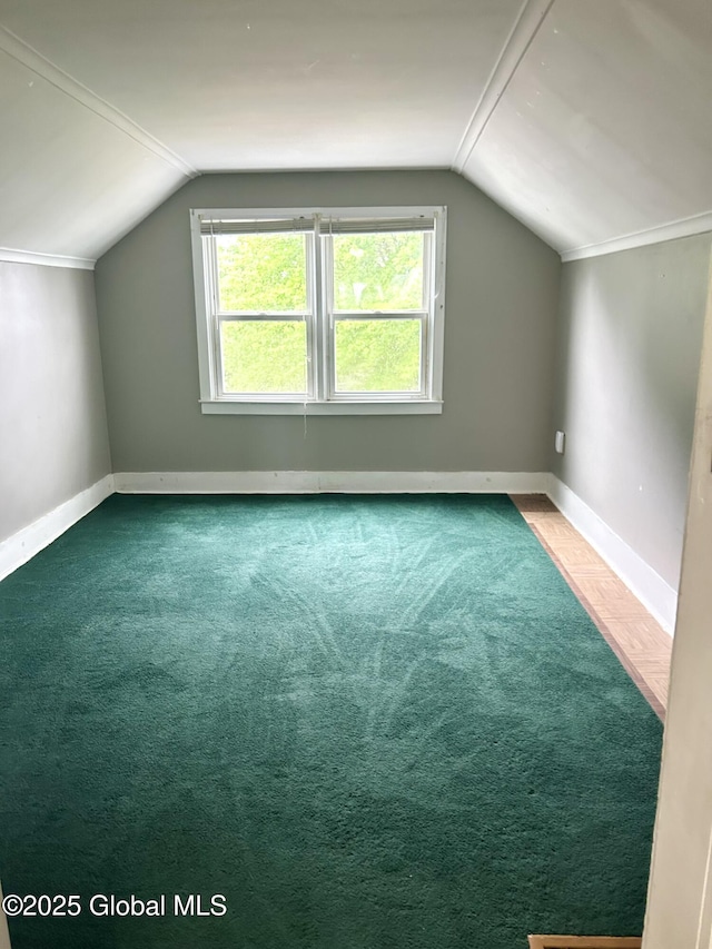 545 Gansevoort Rd, South Glens Falls, NY 12803 - bonus room with lofted ceiling, baseboards, and carpet floors