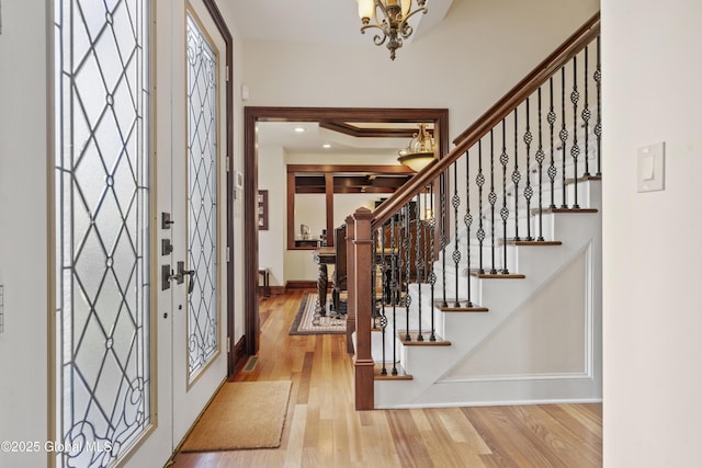 1310 Currybush Rd, Rotterdam, NY 12306 - entrance foyer featuring wood finished floors, a chandelier, stairs, baseboards, and recessed lighting