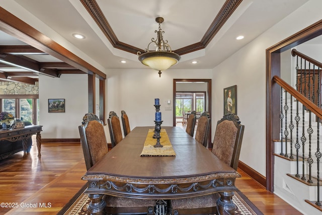 1310 Currybush Rd, Rotterdam, NY 12306 - dining area with wood finished floors, stairway, a raised ceiling, baseboards, and recessed lighting
