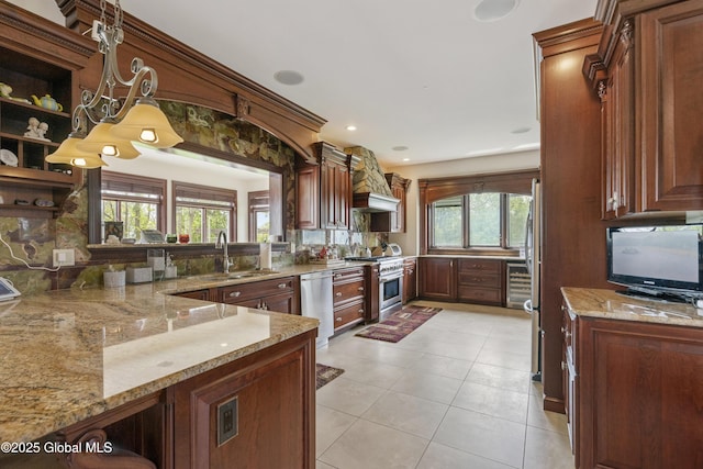 1310 Currybush Rd, Rotterdam, NY 12306 - kitchen featuring a sink, stainless steel appliances, light stone countertops, light tile patterned floors, and tasteful backsplash