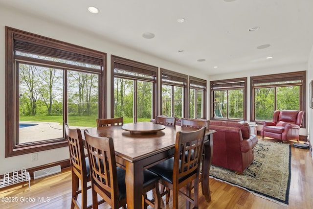 1310 Currybush Rd, Rotterdam, NY 12306 - dining room with healthy amount of natural light, light wood-style flooring, and recessed lighting
