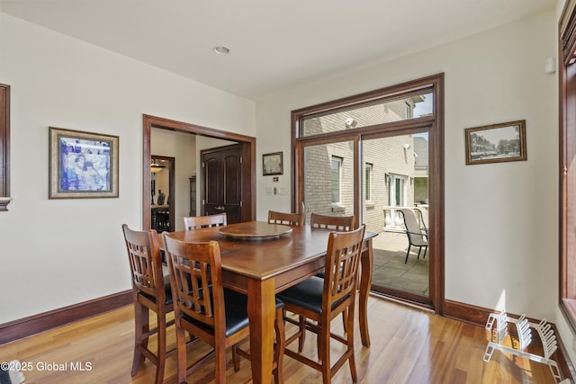 1310 Currybush Rd, Rotterdam, NY 12306 - dining room with light wood-style floors and baseboards