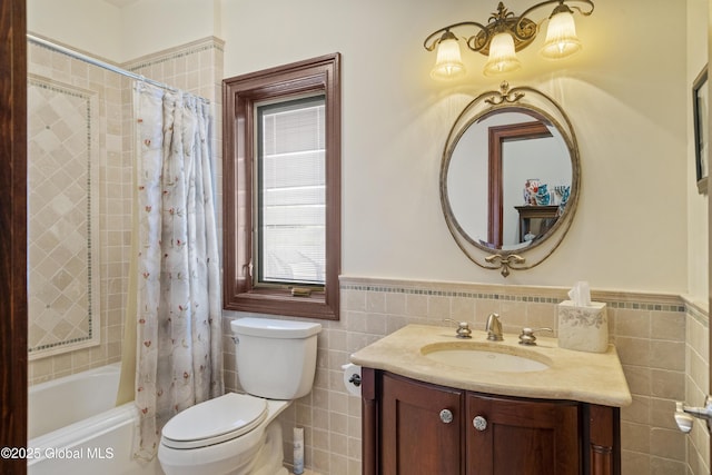 1310 Currybush Rd, Rotterdam, NY 12306 - full bath with tile walls, vanity, toilet, shower / bath combo, and wainscoting