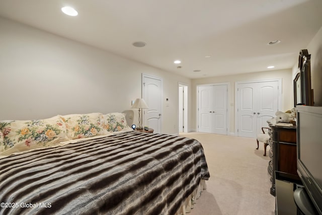 1310 Currybush Rd, Rotterdam, NY 12306 - bedroom featuring light carpet, two closets, and recessed lighting