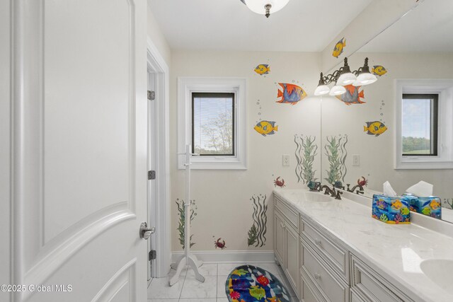 1310 Currybush Rd, Rotterdam, NY 12306 - full bathroom with double vanity, baseboards, and marble finish flooring