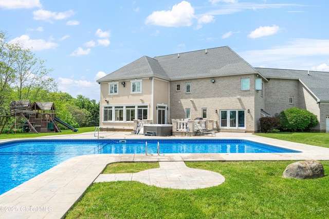 1310 Currybush Rd, Rotterdam, NY 12306 - swimming pool featuring a patio area, a playground, a lawn, and french doors