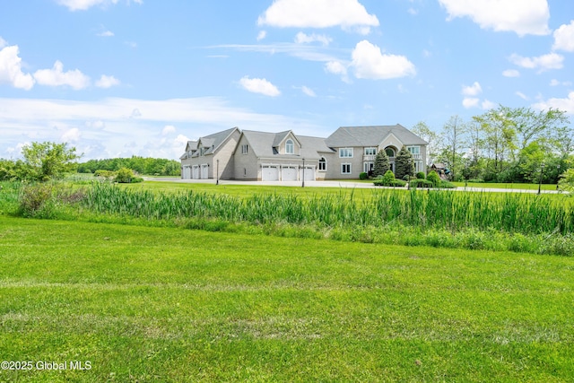 1310 Currybush Rd, Rotterdam, NY 12306 - view of grassy yard featuring driveway and a garage