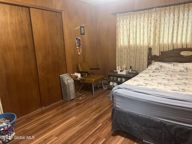 9 Potter St, Glens Falls, NY 12801 - bedroom featuring wood finished floors and a closet