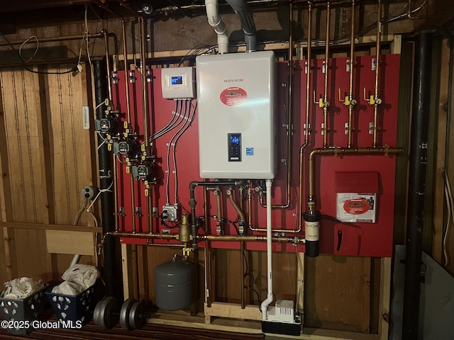 9 Potter St, Glens Falls, NY 12801 - utility room featuring water heater