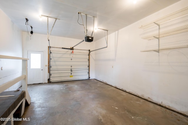 78 Dewitt Ave, Schenectady, NY 12304 - garage featuring a garage door opener