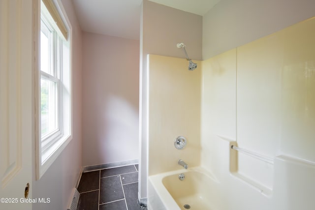78 Dewitt Ave, Schenectady, NY 12304 - full bath with plenty of natural light, shower / bathtub combination, tile patterned floors, and baseboards
