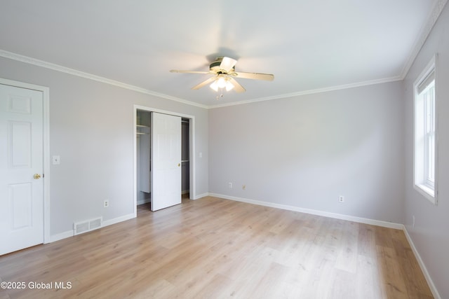 78 Dewitt Ave, Schenectady, NY 12304 - unfurnished bedroom featuring light wood-type flooring, baseboards, a closet, crown molding, and a ceiling fan