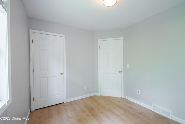 78 Dewitt Ave, Schenectady, NY 12304 - unfurnished bedroom featuring light wood-type flooring and baseboards