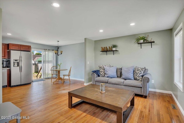 34 Wilson Ave, South Glens Falls, NY 12803 - living area featuring light wood finished floors and recessed lighting