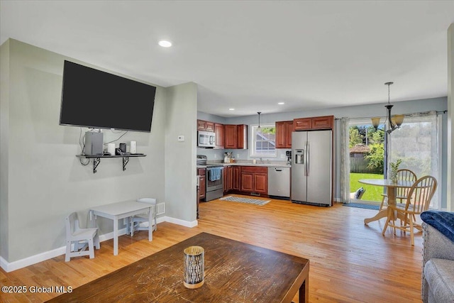 34 Wilson Ave, South Glens Falls, NY 12803 - living area featuring light wood-style flooring, recessed lighting, and a chandelier