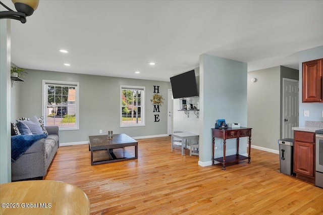 34 Wilson Ave, South Glens Falls, NY 12803 - living room with light wood-style floors and recessed lighting